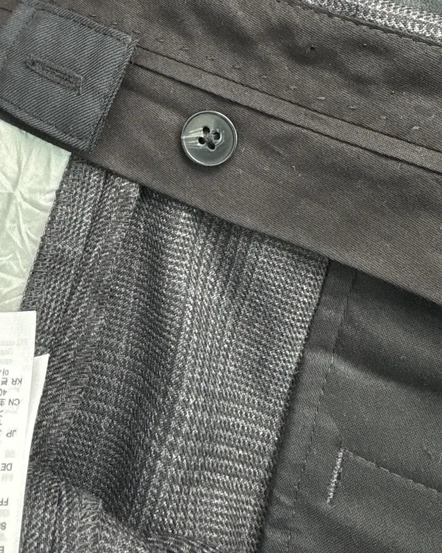 The inside of an altered grey jacket
